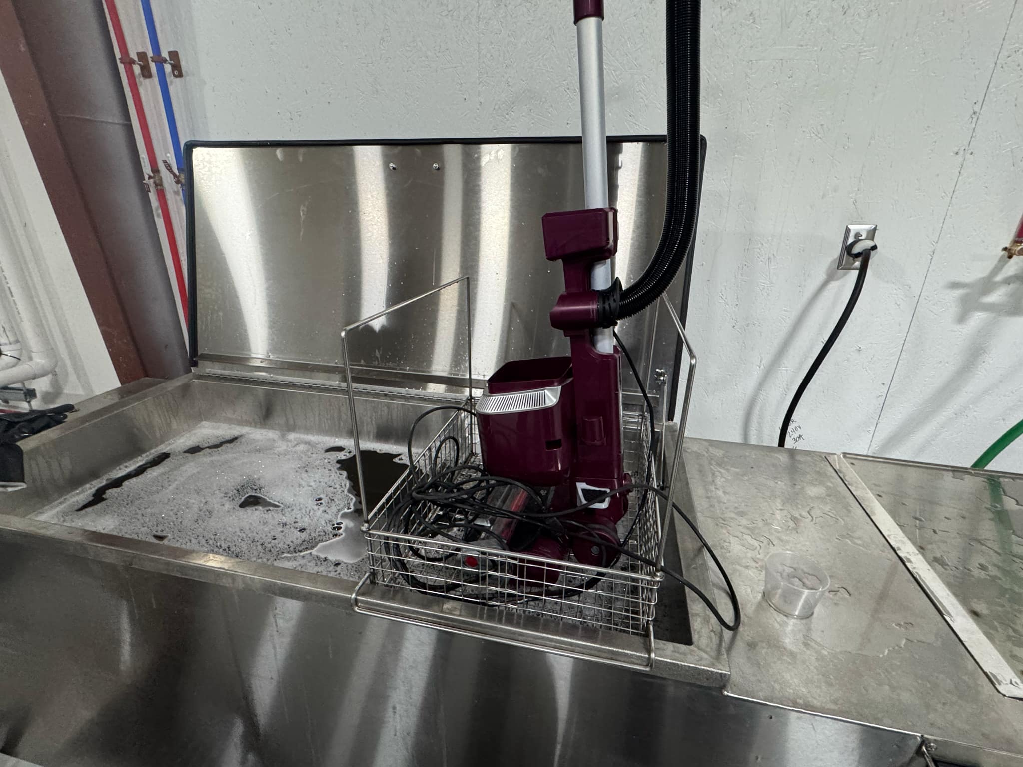 industrial ultrasonic cleaner sitting on top of a counter