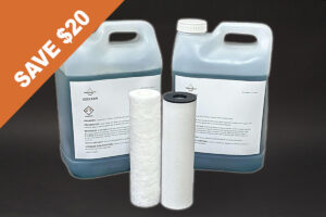 couple of bottles of water sitting next to each other next to the EZClean Base Bundle (Pro & Pro Plus) which is an industrial ultrasonic cleaner