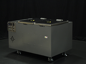 large metal box, the Viking X2 Ultrasonic Cleaner, sitting on top of a black floor